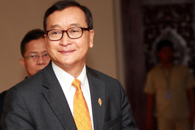 Sam Rainsy, President of the opposition Cambodia National Rescue Party (CNRP), arrives at the National Assembly during a plenary session in Phnom Penh, Cambodia, 09 April 2015. Photo: Mak Remissa/EPA
