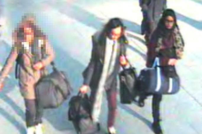 The Australian government has warned women that joining up with the Islamic State group is unlikely to be a "romantic adventure." UK police photo showing three schoolgirls at Gatwick Airport, England on February 17, 2015 who have been reported missing and are believed to be making their way to Syria to meet up with the Islamic State group. Photo: London Metropolitan Police/EPA

