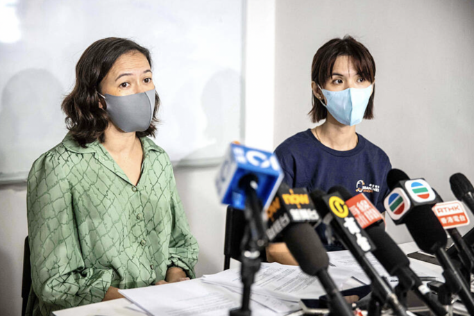 Human rights lawyer Patricia Ho, left, and Michelle Wong, program manager at Stop Trafficking of People speak to the media in Hong Kong yesterday about Hong Kongers being trafficked into Southeast Asia and forced to work in scam syndicates. Photo: AFP
