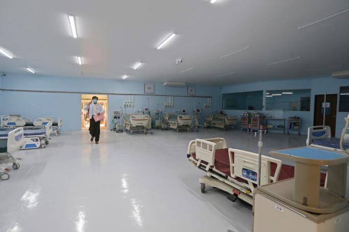 (File) A medical officer walks inside the Intensive Care Unit to treat the COVID-19 patients at the Central Institute of Civil Service (Lower Myanmar) in Yangon, Myanmar, 21 April 2020. Photo: Nyein Chan Naing/EPA