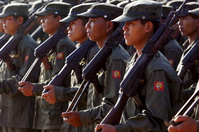 SSA (Shan State Army) soldiers on parade at the jungle stronghold of Doi Tailing in Myanmar's Shan state along the Thai-Myanmar border, Saturday 28 January 2006. Photo: Rungroj Yongrit/EPA

