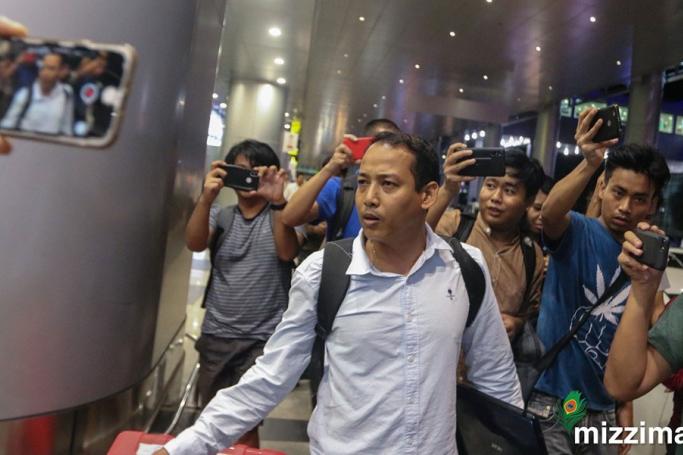 One of six leaders of the Arakan Association who arrested in Singapore arrives back at Yangon International Airport in Yangon on July 10, 2019. Photo: Thura/Mizzima 