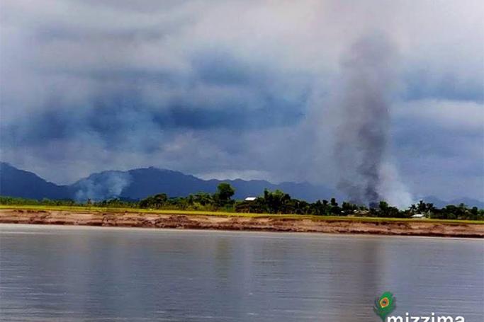 Smoke rises from Sein Nyin Pya village in Buthidaung township on 30 August 2017. Photo: Ko Wai Hin Aung

