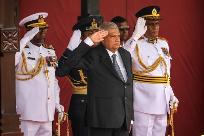 Sri Lankan President Ranil Wickremesinghe (C) watches the 75th Independence Day parade in Colombo, Sri Lanka, 04 February 2023. Photo: EPA