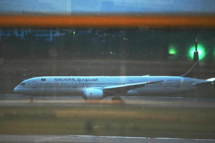 A Saudia Airlines plane believed to be carrying Sri Lankan president Gotabaya Rajapaksa arrive on the tarmac at Changi Airport in Singapore, 14 July 2022. Photo: EPA