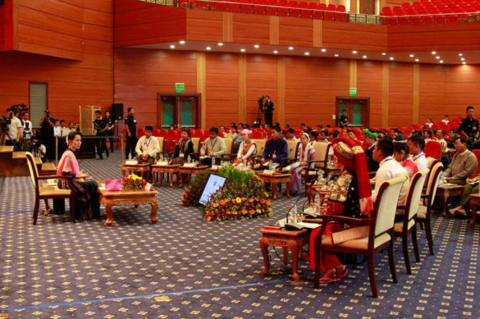 Myanmar's State Counselor Aung San Suu Kyi talks to rural youths during her peace talk conference meeting with Myanmar rural youths at the Myanmar Convention Center - 2 in Naypyitaw on 11 April 2017. Photo: Min Min/Mizzima
