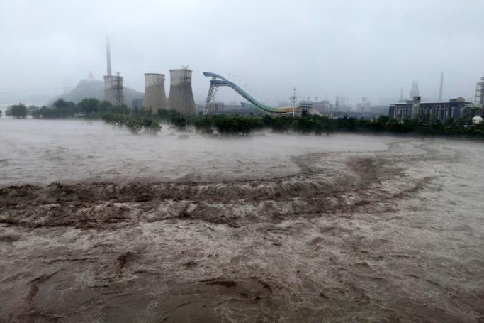 This picture shows a view of the overflooded Yongding River after it is discharged, following heavy rains in Beijing on August 1, 2023. Photo: AFP