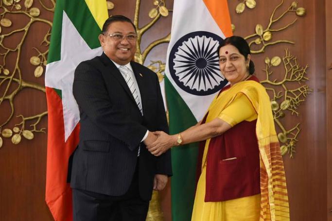 India External Affairs Minister Sushma Swaraj shakes hands with Minister of Foreign Affairs of Myanmar, U Wunna Maung Lwin in New Delhi on July 16, 2015. Photo: Ministry Of External Affairs - India
