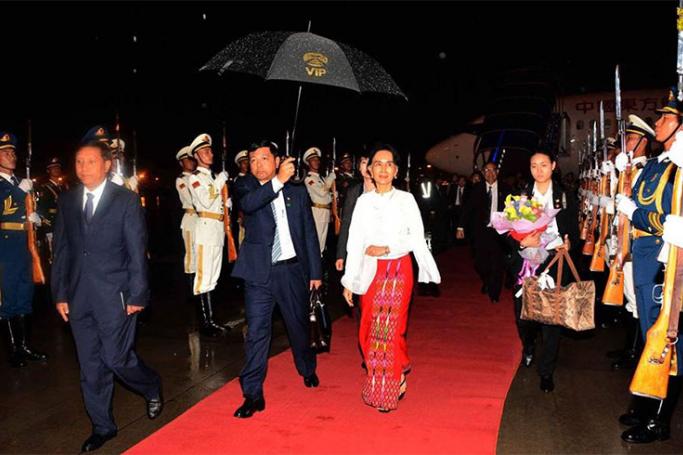 State Counsellor Aung San Suu Kyi, departs from Yangon International Airport to Kumming airport via Beijing in China, on 17 August 2016. Photo: Myanmar State Counsellor Office
