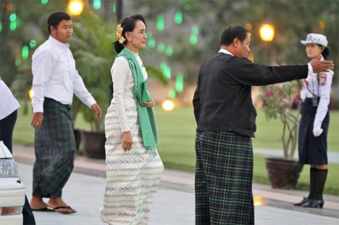 Myanmar's new Foreign minister Aung San Suu Kyi (C) arrives for a dinner reception of the swearing in ceremony of the new government in Naypyitaw on 30 March 2016. Photo: NLD Chairperson
