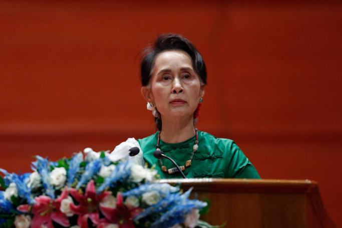 Myanmar's State Counselor Aung San Suu Kyi (R) speaks during the closing ceremony of the third session of the 'Union Peace Conference - 21st century Panglong' in Naypyitaw, Myanmar, 16 July 2018. Photo: Hein Htet/EPA
