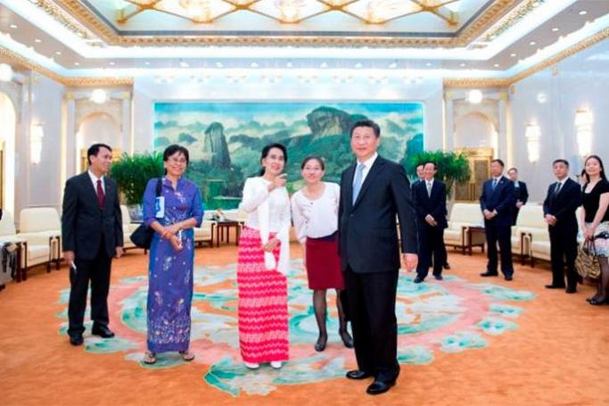 Myanmar‬ State Counsellor Aung San Suu Kyi meets with President Xi Jinping during her visit in Beijing in June, 2015. Photo: NLD Chairperson Facebook
