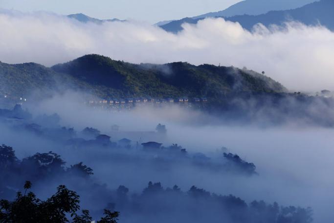 Houses covered with clouds in the morning in Tedim city, Chin State, Myanmar. Photo: Nyein Chan Naing/EPA
