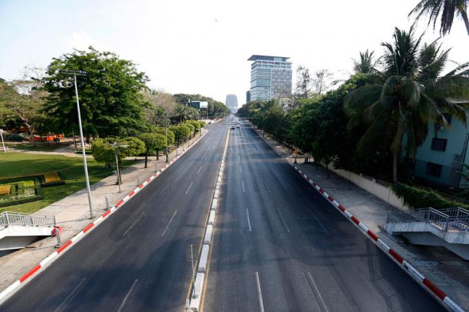 View of a nearly deserted road in Yangon, Myanmar, 10 April 2020. Photo: Nyein Chan Naing/EPA