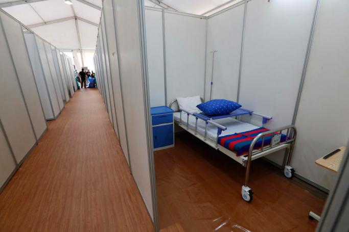 A small room to keep people with COVID-19 is being prepared inside an emergency building, Yangon, Myanmar, 17 September 2020. Photo: Lynn Bo Bo/EPA