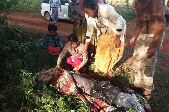 Villagers cover the body of Myanmar land rights activist Htay Aung, who was beaten to death by a mob on 1 November 2017. Photo: Zaw Yan via Facebook
