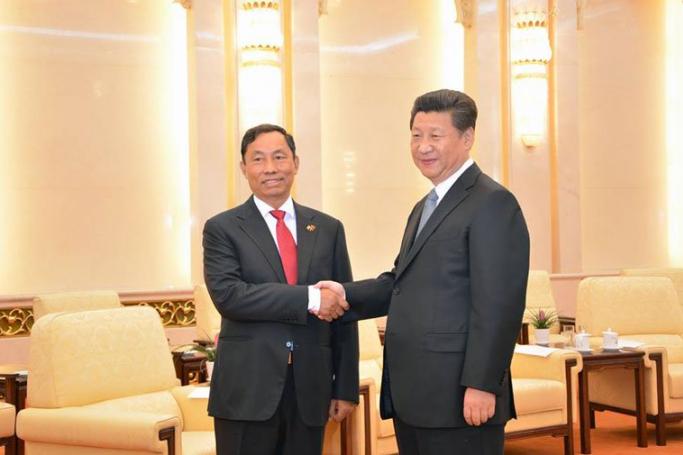 Thura U Shwe Mann, left, meets Chinese President Xi Jinping. Photo: Thura U Shwe Mann/Facebook

