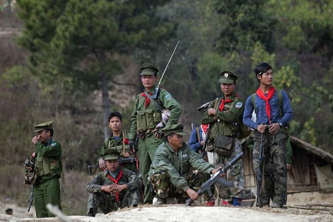 Soldiers of the Ta'ang National Liberation Army (TNLA), a Palaung ethnic armed group, standing guard outside a village in Mantong township, in Myanmar's northern Shan state. Photo: Ye Aung Thu/AFP