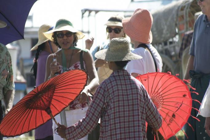  Selling umbrellas to tourists in Myanmar. Photo: Mizzima
