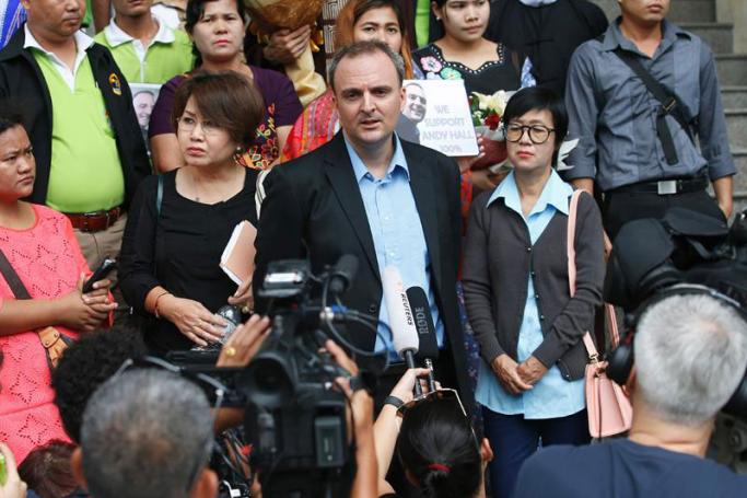 (FILE) British migrant workers rights activist, Andy Hall (C) speaks to the media after his sentencing hearing at the Bangkok South Criminal Court in Bangkok, Thailand, 20 September 2016. Photo: Narong Sangnak/EPA
