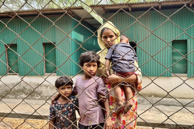 A Rohingya family arrives for a meeting with the Myanmar officials in Teknaf on March 15, 2023. Photo: AFP