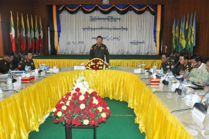 Union Minister for Home Affairs Lt-Gen Ko Ko speaks at the Central Committee for Prevention of Trafficking in Persons meeting at the ministry in Nay Pyi Taw on December 29, 2014. Photo: MNA
