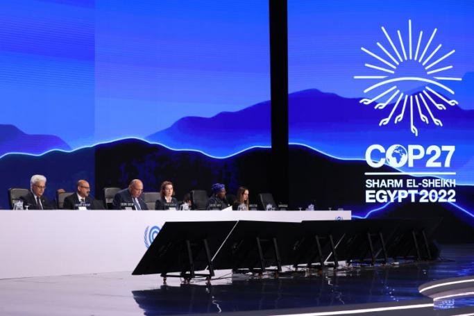 Egypt's Foreign Minister Sameh Shukri, heads the closing session of the COP27 climate conference, at the Sharm el-Sheikh International Convention Centre in Egypt's Red Sea resort city of the same name, on November 20, 2022. (Photo by JOSEPH EID / AFP) 