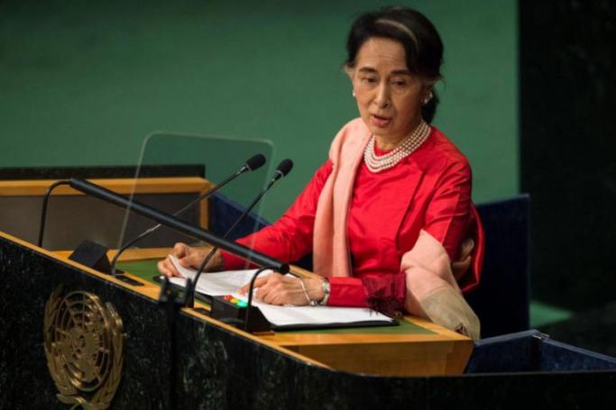 Ms Aung San Suu Kyi is facing a total of 10 corruption charges - each with a possible 15-year jail term. Photo: AFP