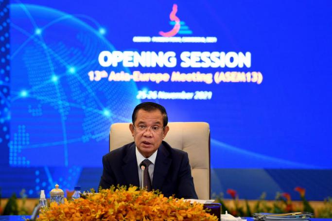  Cambodia's Prime Minister Hun Sen speaking during the opening session of the 13th Asia-Europe Meeting (ASEM13) at the Peace Palace in Phnom Penh. Photo: AFP