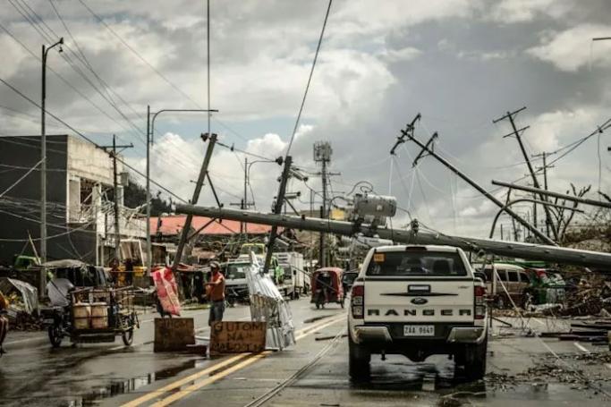 More than 300,000 people fled their homes and beachfront resorts as Rai slammed into the country on Thursday as a super typhoon (AFP/Ferdinandh CABRERA)