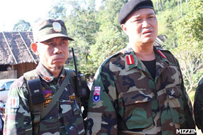 Col. Nerdah Mya, right, of the Karen National Liberation Army and Lieutenant Steel, the commanding officer of Democratic Karen Buddhist Army Battalion 909. The photograph was taken at an unknown location.