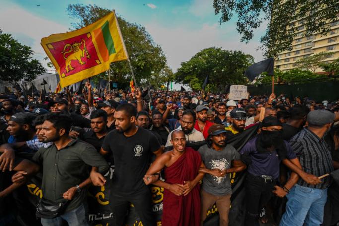Demonstrators shout slogans during a protest on the 50th day of anti-government protests demanding the resignation of Sri Lanka's President Gotabaya Rajapaksa over the country's crippling economic crisis, in Colombo on May 28, 2022. Photo: AFP