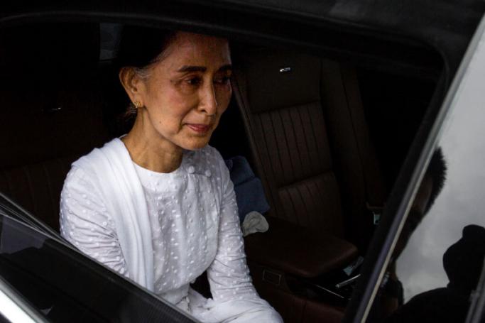 Myanmar's State Counselor Aung San Suu Kyi leaves after attending the funeral service for the National League for Democracy (NLD) party's former chairman Aung Shwe in Yangon. Photo: AFP