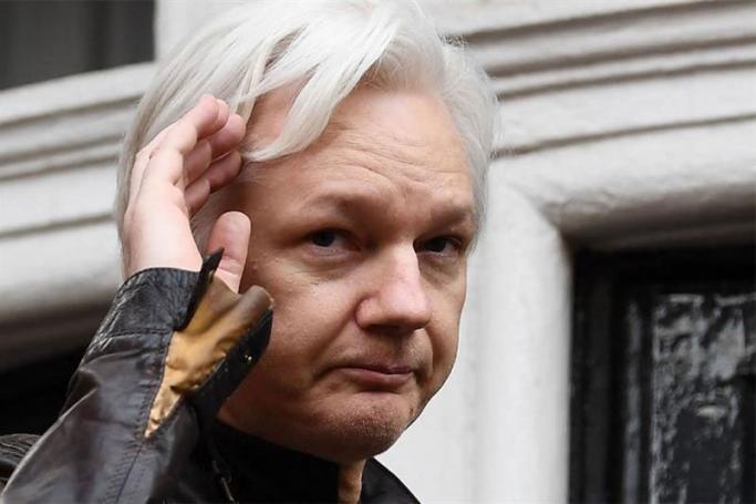 Wikileaks founder Julian Assange gestures as he speaks on the balcony of the Embassy of Ecuador in London. Photo: AFP