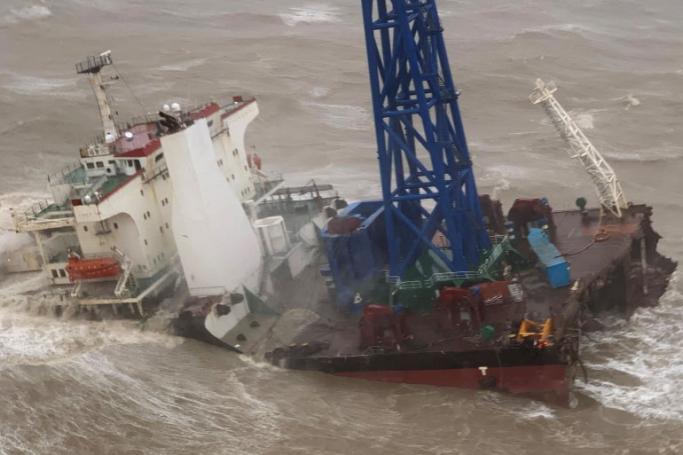A ship broken into two amid Typhoon Chaba in the South China Sea. Photo: AFP
