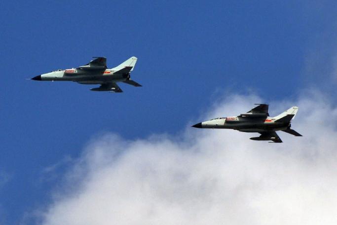   Chinese People's Liberation Army (PLA) fighter jets leaving their base in Shanghai. Photo: AFP