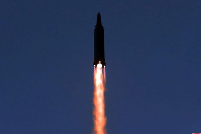 This picture taken on January 11, 2022 and released from North Korea’s official Korean Central News Agency (KCNA) on January 12, 2022 shows what North Korea says a hypersonic missile test-fire conducted by the Academy of Defence Science of the DPRK at an undisclosed location. (Photo by various sources / AFP) / South Korea OUT /