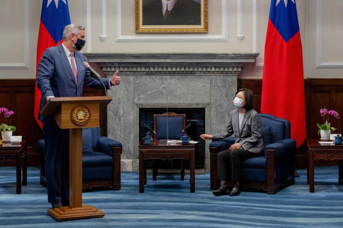 A handout photo made available by the Taiwan Presidential Office shows Taiwan President Tsai Ing-wen (R) listening to Indiana Governor Eric Holcomb (L) during a meeting inside the Presidential office in Taipei, Taiwan, 22 August 2022. Photo: EPA/Taiwan Presidential Office