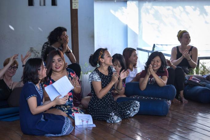 Nandar (C), co-director for Myanmar's first ever Burmese-language "Vagina Monologues" feminist play, watching a rehearsal with other performers ahead of their upcoming show in Yangon. Photo: Sai Aung Main/AFP