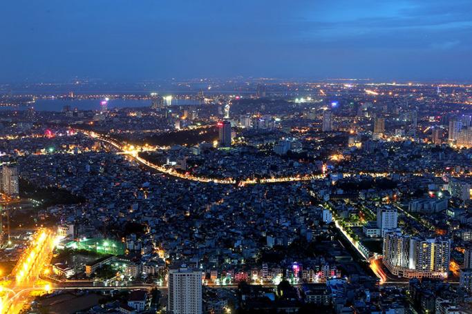 A general view in the evening of Hanoi city from the 72th floor of Keangnam Hanoi Landmark Tower, in Hanoi, Vietnam. Photo: EPA
