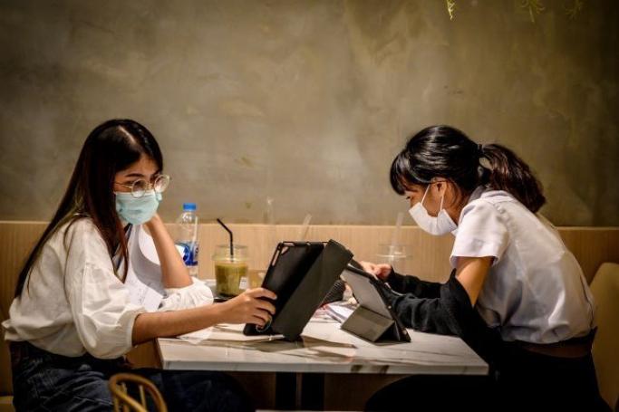 The COVID-19 epidemic has since reached almost 90 countries, wreaking havoc on international business, tourism, sports events and schools -- with almost 300 million students sent home worldwide (Photo: AFP)