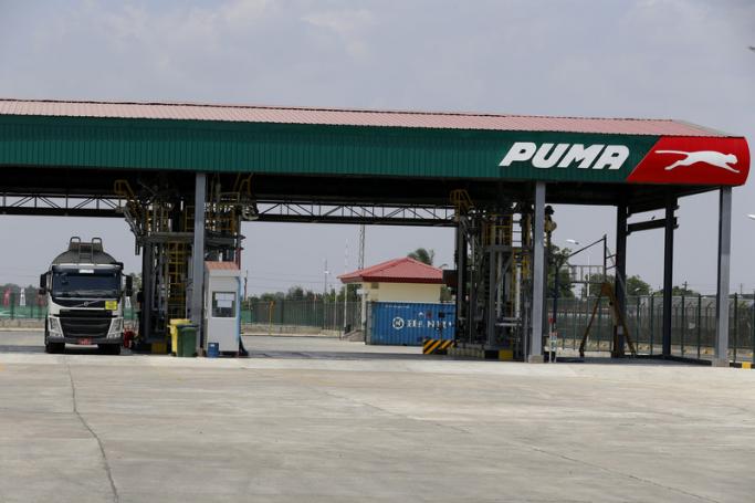An oil tanker truck stop inside the Puma Energy Asia Sun petroleum products terminal in Thilawa port, Yangon, Myanmar, 06 May. Photo: EPA
