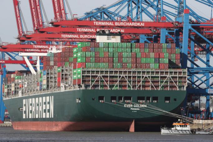 The container ship Ever Golden of Evergreen shipping lines docks at the Burchardkai container terminal of port operator HHLA in Hamburg, northern Germany. Photo: EPA