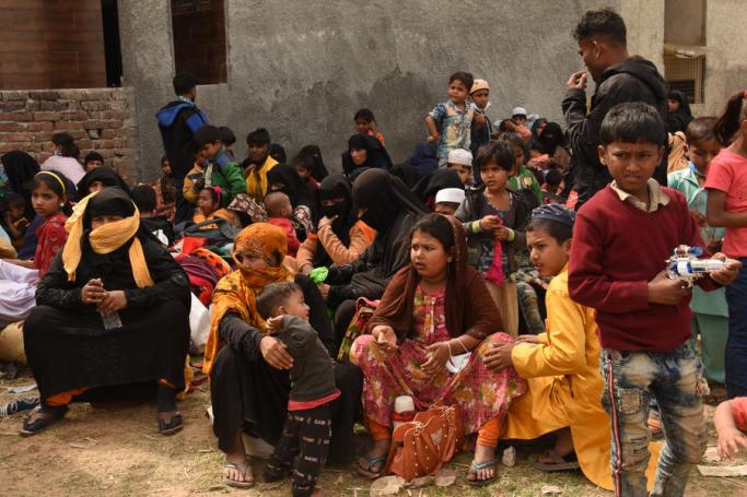 Rohingya Muslims from Myanmar along with their luggage gather outside a Mosque in Jammu, the winter capital of Kashmir, India, 07 March 2021. Photo: EPA