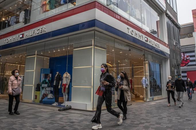 H&M and Nike many other international clothing brands face backlash in China for refusing to buy Xinjiang cotton over claims of forced labor and repressions against Uighurs in the region. Photo: EPA