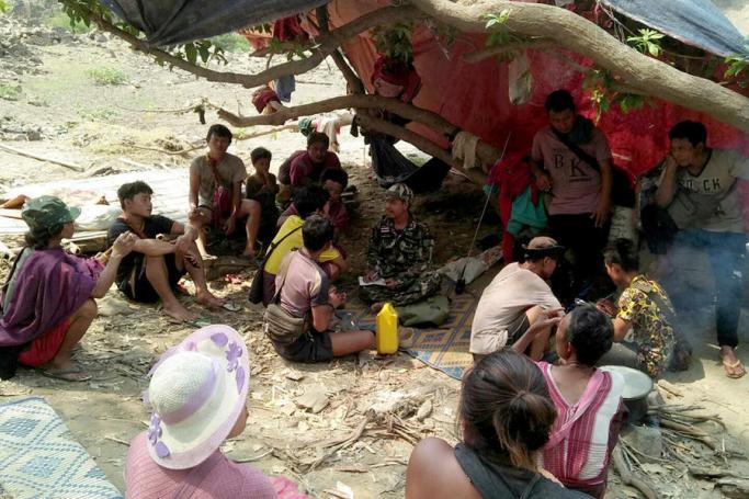 Ethnic Karen villagers fleeing from air attacks by Myanmar military take rest in a jungle after crossing border at a Thai-Myanmar border in Mae Hong Son province, Thailand, 28 March 2021 (issued 29 March 2021). Photo: EPA