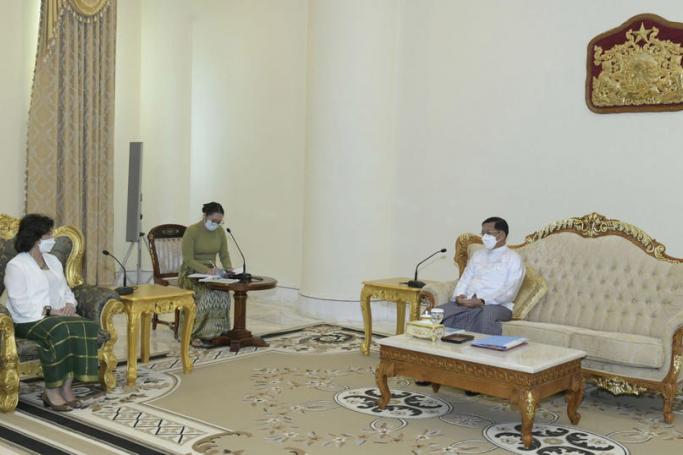 A handout photo made available by the Myanmar Information ministry shows the United Nations' new special envoy for Myanmar Noeleen Heyzer (L) talking with Myanmar military chief and Chairman of the State Administration Council Senior General Min Aung Hlaing (R) during their meeting in Naypyitaw, Myanmar, 17 August 2022 (issued 18 August 2022). Photo: EPA