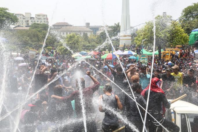 Trying to cool down in Myanmar during the water festival - Photo: Hong Sar/Mizzima
