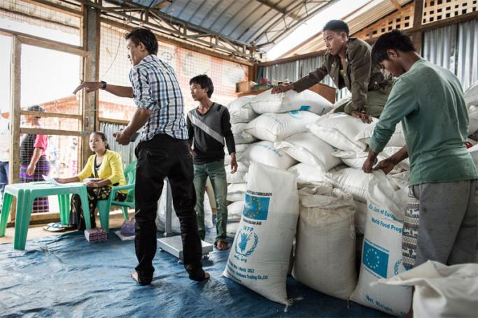 Since 2013, 95 percent of the rice, chickpeas and salt which WFP distributes in Myanmar has been purchased in the country, contributing more than €40 million to the national economy and encouraging local agricultural production. Photo: World Food Programme/Chris Terry
