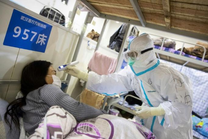 The WHO has praised China for taking drastic measures to contain the virus (AFP Photo)